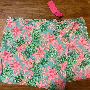 Lilly pultizer skort with skirt flap in the front and shorts showing on the back